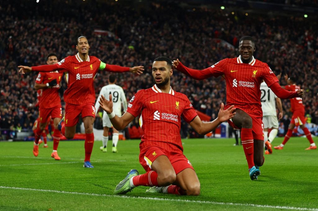 Liverpool seize Champions League top spot after beating Madrid 2-0