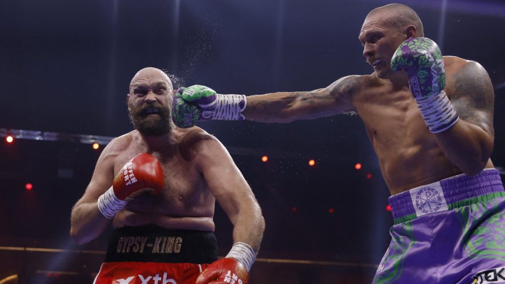 Usyk beats Fury by decision to retain world heavyweight titles